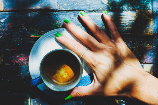 Woman hand and espresso