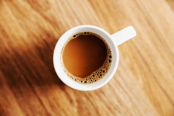 istock Top view of fresh morning coffee arabica on table. 1201029633