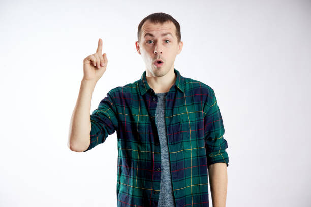 istock Man came up with a brilliant idea. Guy on a white background isolate 1201029642