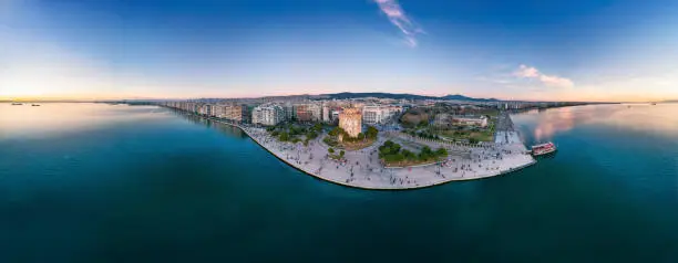 Aerial panorama of Thessaloniki, Greece. The waterfront features White Tower and the cityscape by the sea.