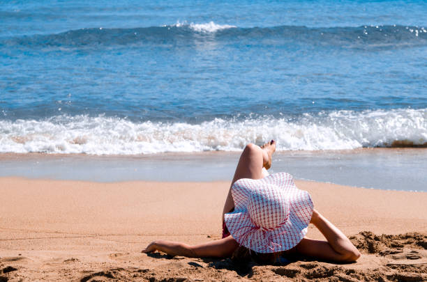 istock Hedonism and meditation on the beach 1201031822