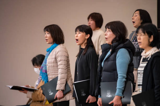 istock Women's chorus concert - rehearsal 1201035056