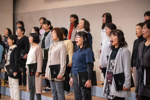 istock Women's chorus concert - rehearsal 1201035112