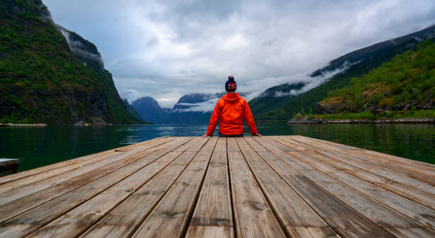 istock Tourist on Stegastein viewpoint, Norway 1201039289