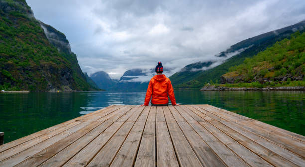 istock Tourist on Stegastein viewpoint, Norway 1201039352