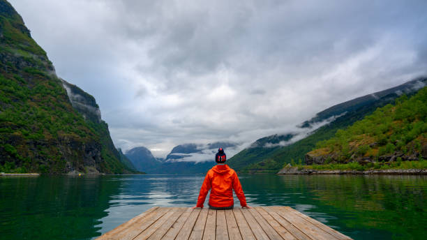 istock Tourist on Stegastein viewpoint, Norway 1201039829