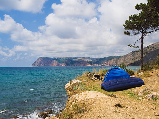 Camping on the beach stock photo