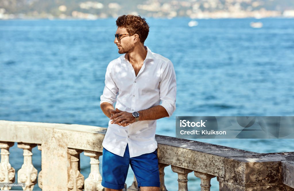 Young Handome Man In White Shirt Relaxing Stock Photo - Download Image ...