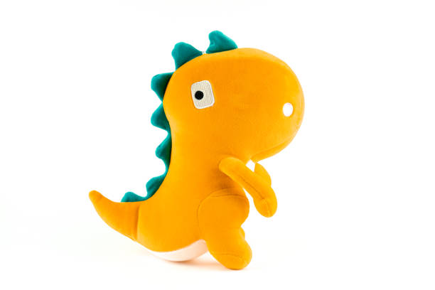 muñeca de felpa de dinosaurio, lindo juguete de dinosaurio. - muñeco de peluche fotografías e imágenes de stock