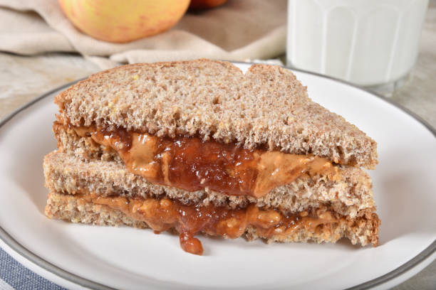 istock Peanut butter and jam sandwich on wholegrain bread 1201046850