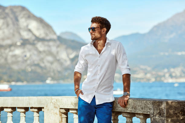istock Young Handome man in white shirt relaxing 1201049345