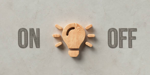 istock wooden lightbulb with the words ON and OFF - 3D rendered illustration 1201052026