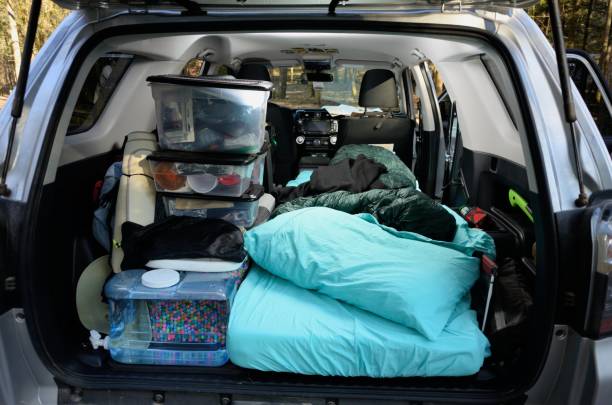 istock Bed and pillow in car camper setup 1201052423