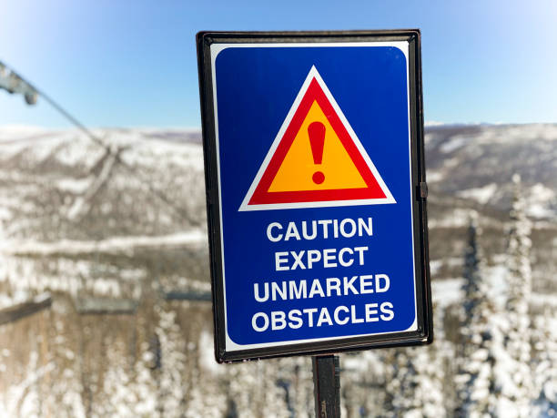 Caution Sign Caution sign at a ski resort. ski patrol photos stock pictures, royalty-free photos & images