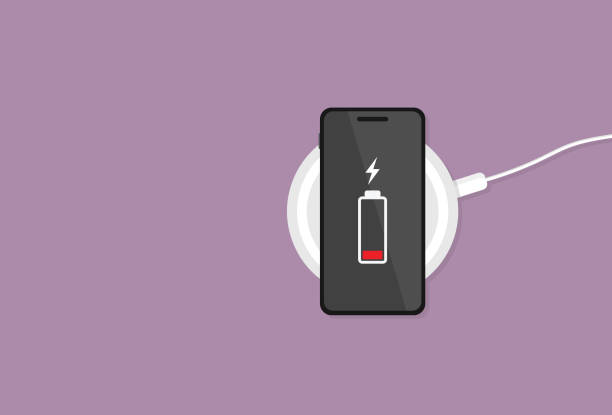 The mobile phone has a low battery on a wireless charger Battery Charger, Wireless charging, Technology, Smartphone, Empty battery phone charger stock illustrations