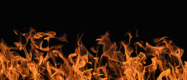 istock flame of fire isolated on black background in panorama 1201067672