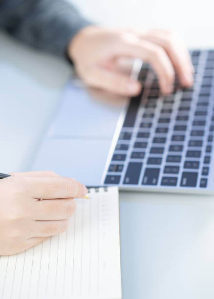 istock Woman working at home office using laptop searching web, browsing information 1201070037
