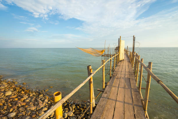 istock A fishermen jetty with sunset in Malaysia 1201073863