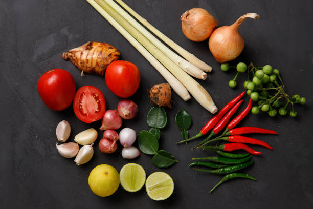 istock Thai kitchen. Various herbs, spices  and Ingredients on dark background. Top view 1201079164