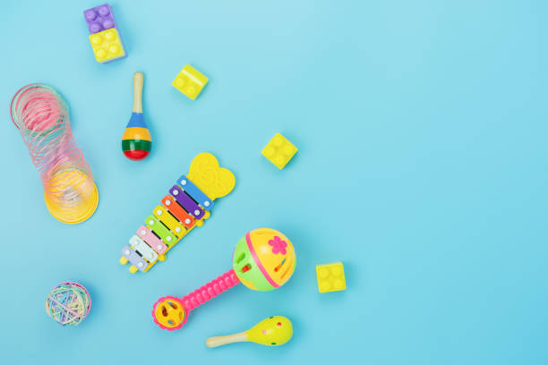 istock Table top view decoration kid toys for develop background concept.Flat lay accessories baby to play with items child on modern blue paper at office desk.Copy space for add text.pastel tone wallpaper. 1201079356