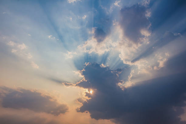 istock Besutiful ray of sunlight breaking through clouds at sunset. 1201080033