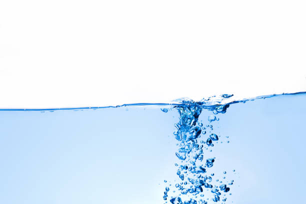 istock The bubbles in clear blue water are ready to drink on a white background. 1201088347