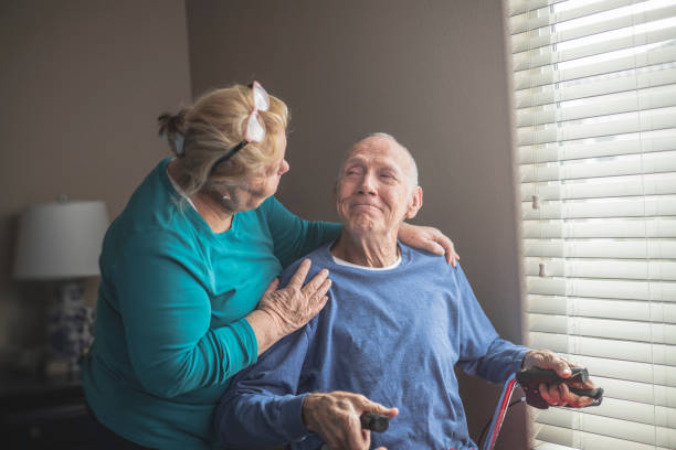 At Home Care Giver At home on hospice with wife hospice photos stock pictures, royalty-free photos & images