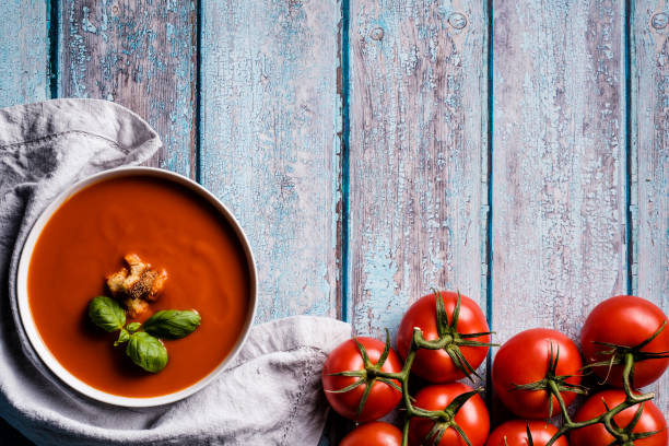 istock Tomato soup with basil in a bowl 1201091394