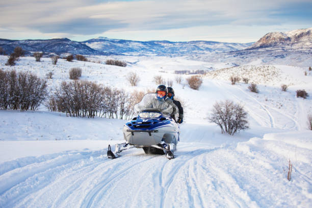 istock Driving snowmobile in Colorado, USA 1201102647