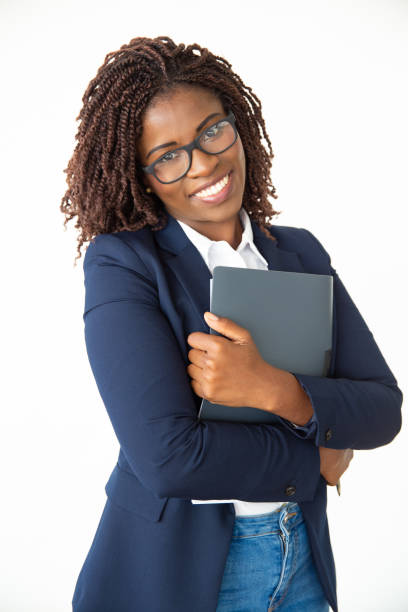 istock Cheerful young businesswoman holding folder 1201103862