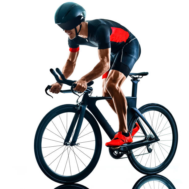 istock triathlete triathlon Cyclist cycling silhouette isolated white background 1201107647