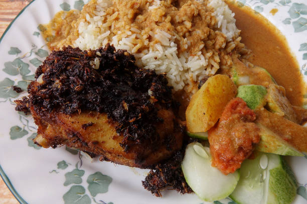 istock Traditional steam rice with curry and fried chicken. 1201107744