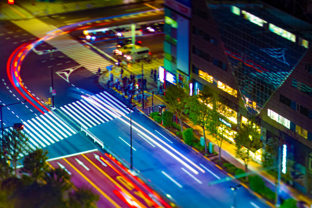 A night street at the urban city in Tokyo tiltshift A night street at the urban city tiltshift high angle. Bunkyo district Suidobashi Tokyo / Japan - 11.11.2019 diorama photos stock pictures, royalty-free photos & images
