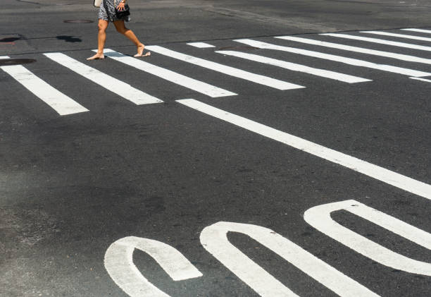 istock Pedestrians crossing at intersection, New York City 1201110706