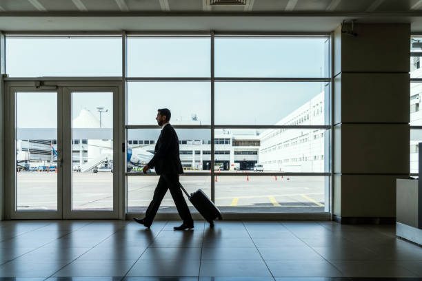 istock Businessman in airport 1201114820