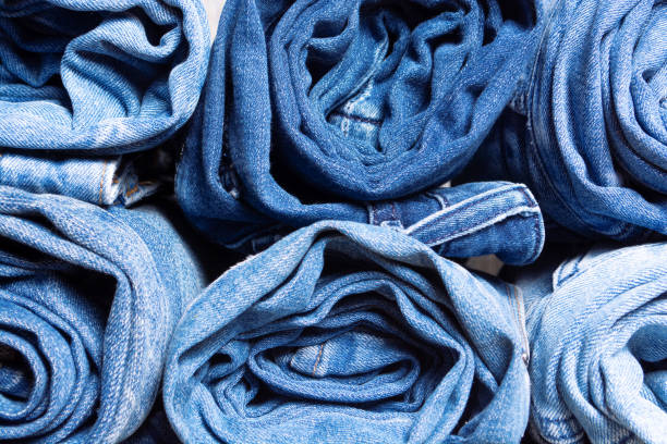 istock Classic blue, indigo, navy blue color jeans making rolls shape 1201114974