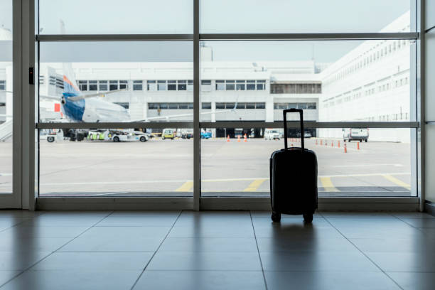 istock Suitcase in the airport 1201115010