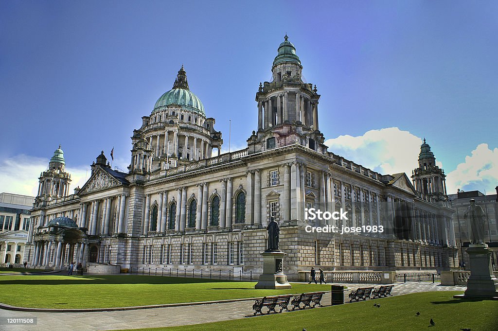 Exterior of City Hall building in Belfast, Northern Ireland Beautiful Picture of City Hall in Belfast Northern Ireland, with bright blue sky. Architectural Column Stock Photo