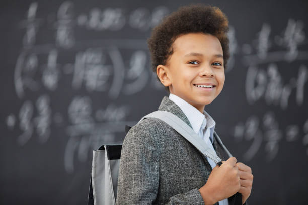 istock African schoolboy is going to school 1201115926