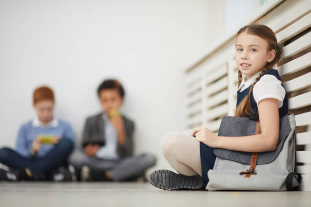 istock Schoolgirl resting after lessons 1201115996