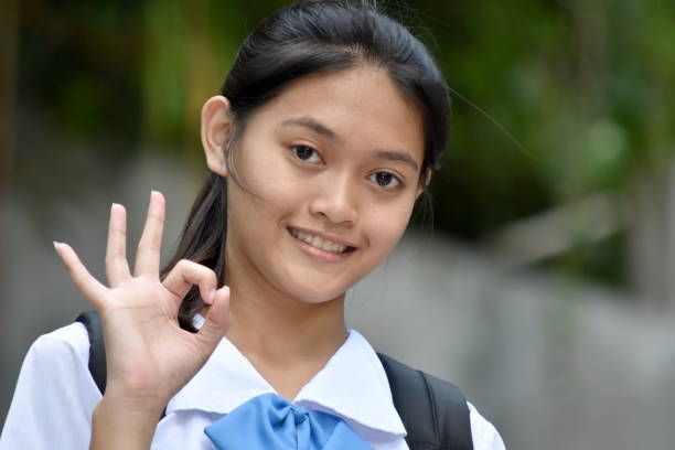 istock An Ok Pretty Filipina Female Student 1201116580