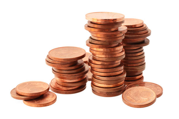 istock Euro coins in stacks isolated on white 1201116669