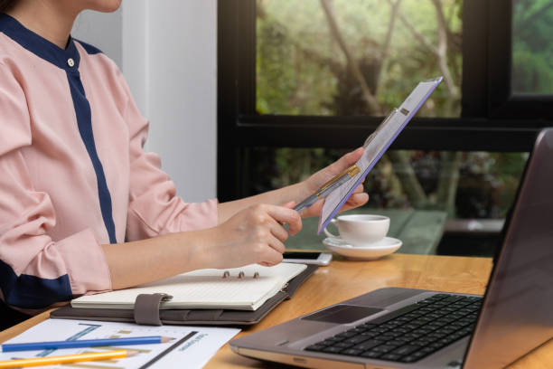 istock Freelancer business woman working with computer laptop in cafe. 1201116758