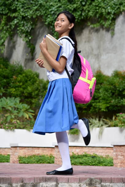 istock A Minority Girl Student And Happiness 1201117638