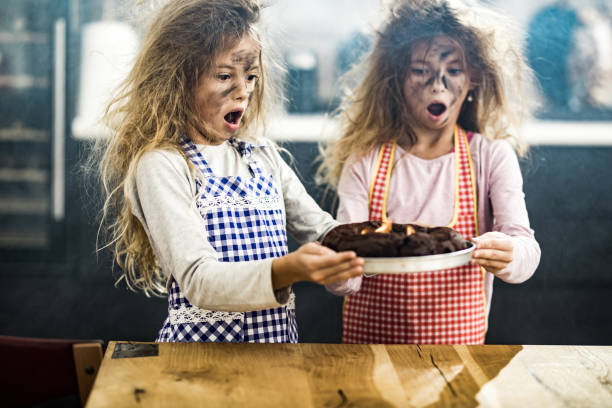 istock Oh my God, we have burnt the cake! 1201119945