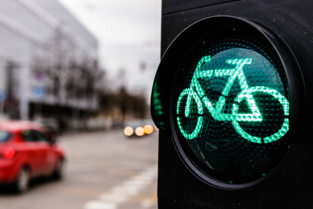 istock Traffic light for cyclists. Green light for bycicle lane on a traffic light. 1201124056