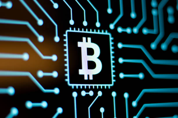istock Technology Background and Circuit Board With Bitcoin icon. Close-Up Computer Screen Concept. 1201128966