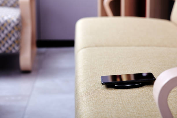 istock The wireless charging phone is on the sofa 1201130720