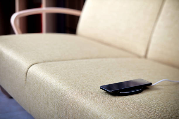 istock The wireless charging phone is on the sofa 1201131332