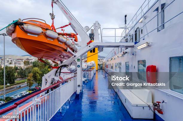 A Large Rescue Boat Is Attached To The Brackets On The Deck Of The Ship Stock Photo - Download Image Now